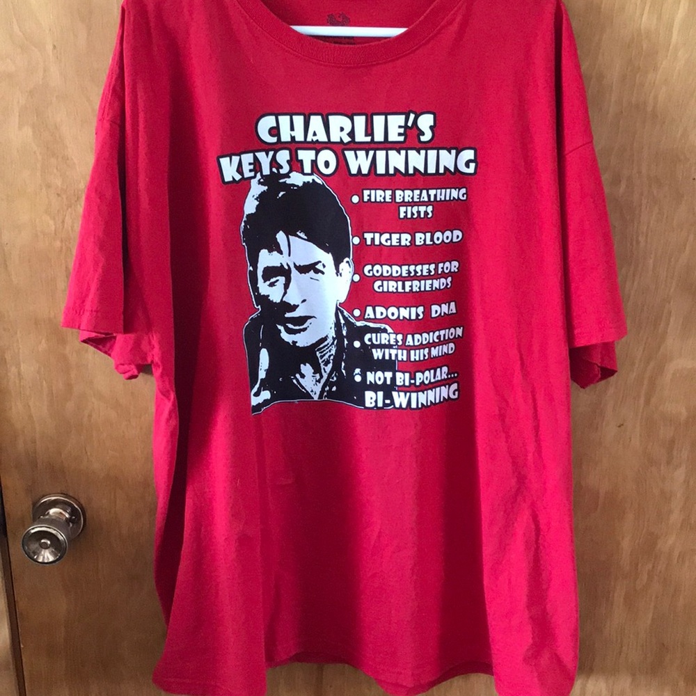 Bright Red shirt  Charlie face on it